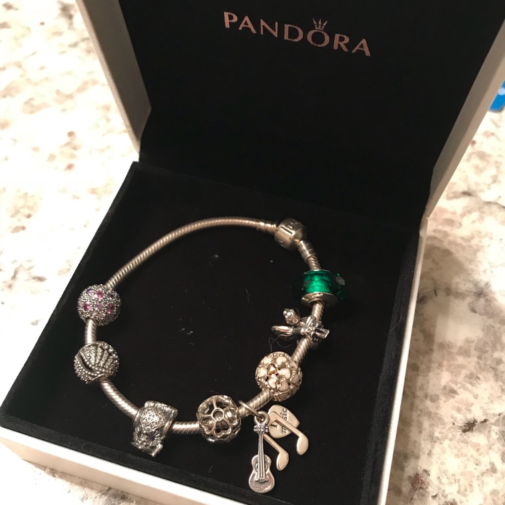 Pandora bracelet with 6 charms!